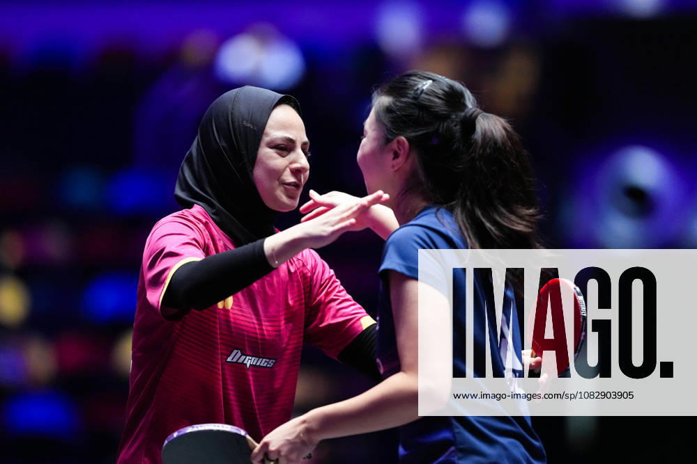 (260911) -- MACAO, Sept. 11, 2026 -- Dina Meshref (L) greets Lili Zhang after the women s singles round of 16 match between Dina Meshref of Egypt and Lili Zhang of the United States at the 2026 World Table tennis, Tischtennis (WTT) Champions Macao in Macao, south China, Sept. 11, 2026. ) (SP)CHINA-MACAO-TABLE TENNIS-WTT-WOMEN S SINGLES (CN) CheongxKamxKa