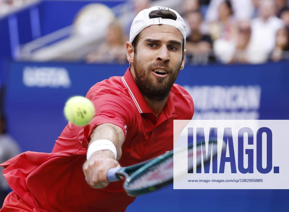 Karen Khachanov hits a backhand return to Alexander Zverev of Germany during the second set of the Men s semifinals in Arthur Ashe Stadium at the 2026 US Open Tennis Championship at the USTA Billie Jean King National Tennis Center in New York City on Friday, September 11, 2026. NYP20260911819 JOHNxANGELILLO