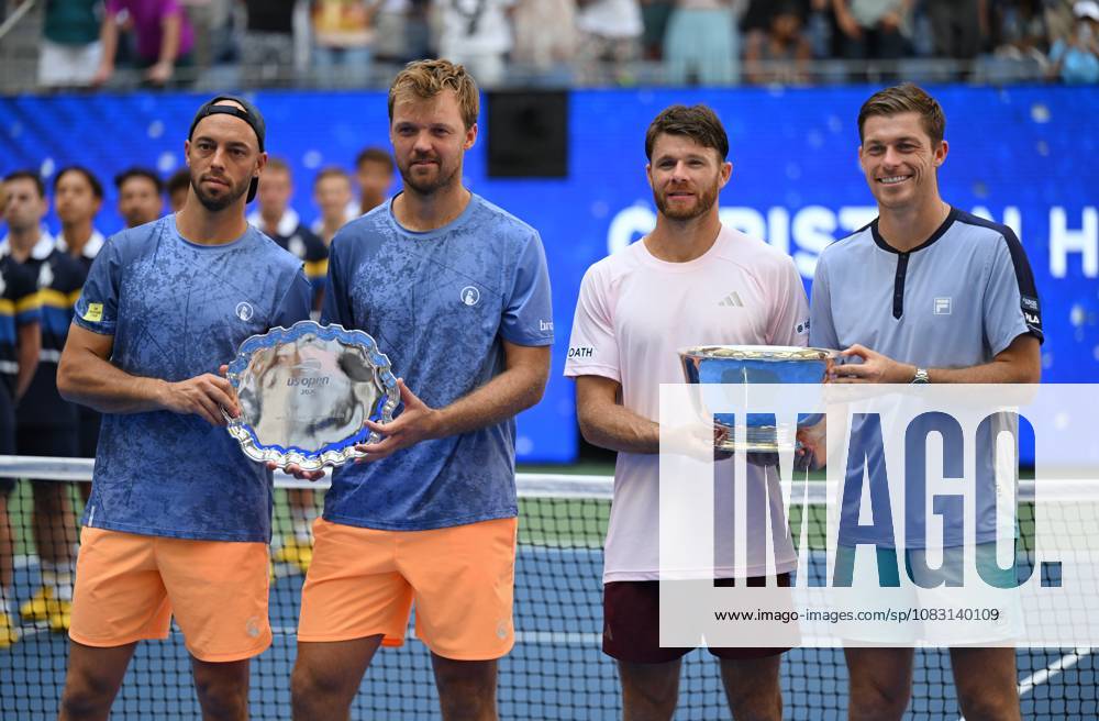 (260913) -- NEW YORK, Sept. 13, 2026 -- Christian Harrison (the United States, 2nd L) Neal Skupski (Britain, 2nd R) and Kevin Krawietz (1st L) Tim Puetz of Germany pose for photos during the awarding ceremony after their men s doubles final match at the 2026 US Open tennis championships in New York, the United States, Sept. 12, 2026. ) (SP)U.S.-NEW YORK-TENNIS-US OPEN-MEN S DOUBLES-FINAL LixRui