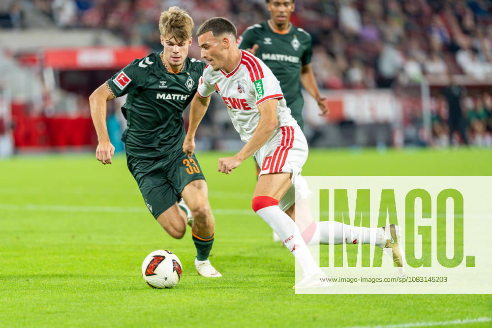 Mick Schmetgen of SV Werder Bremen, No. 33, in a tackle with Said El Mala of 1. FC Köln, No. 10; 1. FC Köln vs. SV Werder Bremen, soccer, Bundesliga, Matchday 3, 2026–27 season, September 12, 2026, DFL regulations prohibit any use of photographs as image sequences and or quasi-video, 1. FC Köln vs. SV Werder Bremen, Soccer, Bundesliga, Matchday 3, 2026–27 Season, September 12, 2026, Cologne