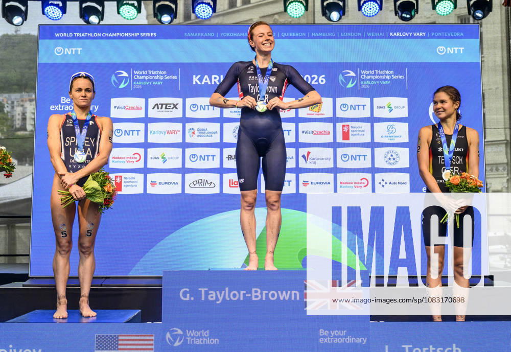 Triathlon World Championship, WM, Weltmeisterschaft races, women, September 13, 2026, Karlovy Vary, Czech Republic. (L-R) Second placed Taylor Spivey of USA, winner Georgia Taylor-Brown of Britain and third placed Lisa Tertsch of Germany. (CTKxPhoto OndrejxHajek) CTKPhotoP2026091302913 CTKPhotoP2026091302913