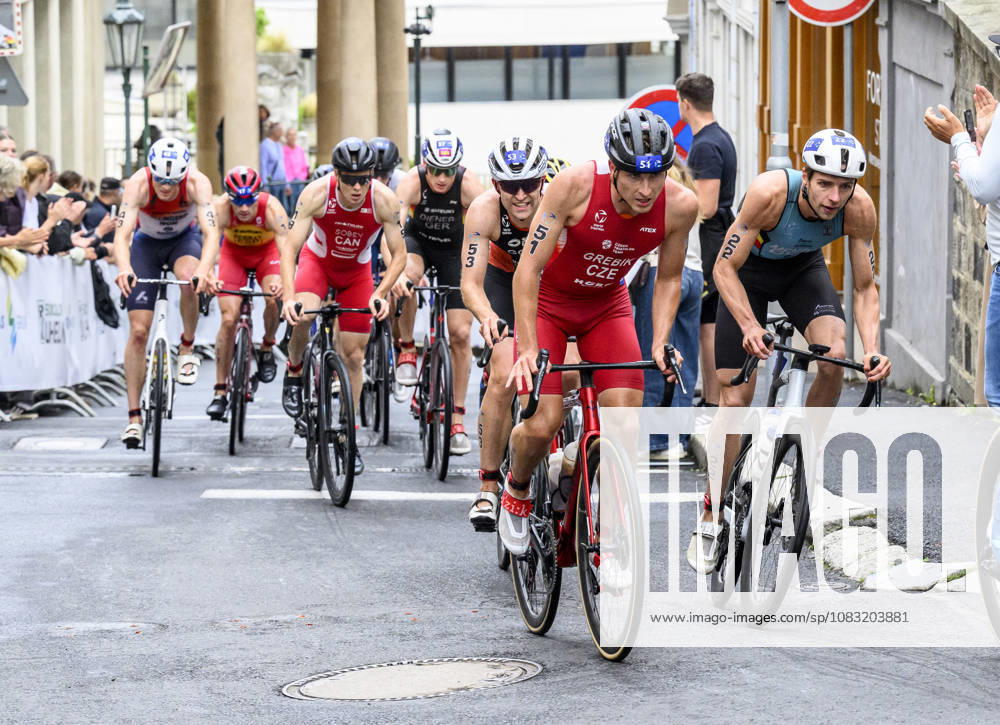 Triathlon World Championship, WM, Weltmeisterschaft races, men, September 13, 2026, Karlovy Vary, Czech Republic. From right Arnaud Mengal of Belgium, Radim Grebik of Czech Republic and Victor Goene of Netherlands. (CTKxPhoto OndrejxHajek) CTKPhotoP2026091304530 CTKPhotoP2026091304530