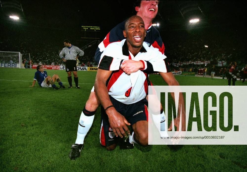 Football : Italy v England World Cup Qualifier in Rome.11 10 1997 Ian Wright (Eng) and Robbie Fowler celebrate qualification to the World Cup Finals after drawing 0-0 with Italy