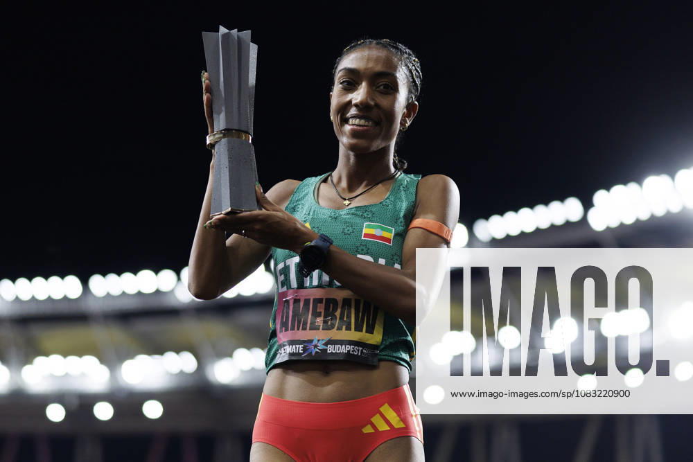 BUDAPEST, HUNGARY - SEPTEMBER 13, 2026:Likina AMEBAW (ETH Ethiopia 5000 Meter) presents the trophy during the World Athletics Ultimate Championship at Gyula Zsivotzky National Athletics Centre on September 13, 2026 in Budapest, Hungary. Hungary