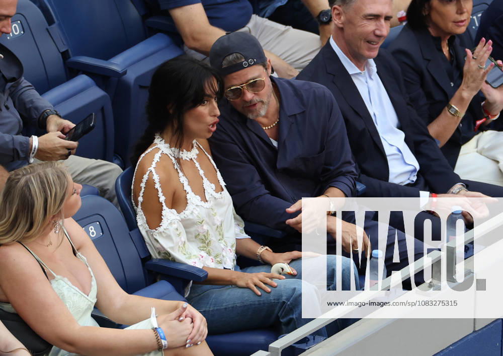 BRAD PITT and his girlfriend INES DE RAMON of USA during the menâ€⠢s final of US Open A. Zverev of Germany - B. Shelton of USA. New York, USA. New York City USA - ZUMAc278 20260913_zsp_c278_005