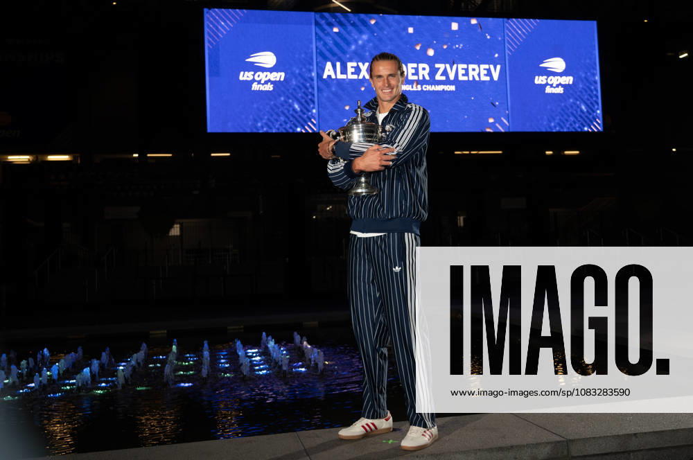 2026 US Open - Day 15 NEW YORK, NEW YORK - SEPTEMBER 13: Alexander Zverev of Germany poses with the trophy in front of the Arthur Ashe Stadium after winning the mens singles final against Ben Shelton of the United States (not pictured) during the 2026 US Open - Day 15 at USTA Billie Jean King National Tennis Center on September 13, 2026 in New York, New York. New York USTA Billie Jean King National Tennis Center New York United States