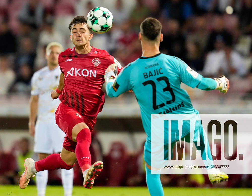 Thomas Kastanaras (FC Wuerzburger Kickers, 19) heads the ball on a shot on goal against Stefan Bajic (TSV Alemannia Aachen, 23) just before a collision; Bajic is injured in the play and receives a red card (GER), FC Würzburg Kickers vs. TSV Alemannia Aachen, 3rd Division, Matchday 6, 2026–27 Season, AKON Arena, Würzburg, September 15, 2026 Würzburg Kickers vs. Alemannia Aachen, 3rd Division, Matchday 6, 2026–27 season, September 15, 2026, Würzburg