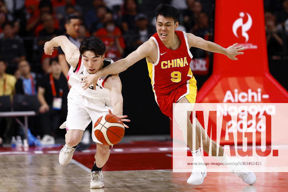 Aichi-Nagoya Asian Games: Basketball China s Pang Zhenglin (R) and Japan s Kotetsu Kurokawa vie for the ball during the third quarter of a men s basketball semifinal match at the Aichi-Nagoya Asian Games at Aichi International Arena in Nagoya, central Japan, on Sept. 18, 2026. A14AA0005627847P