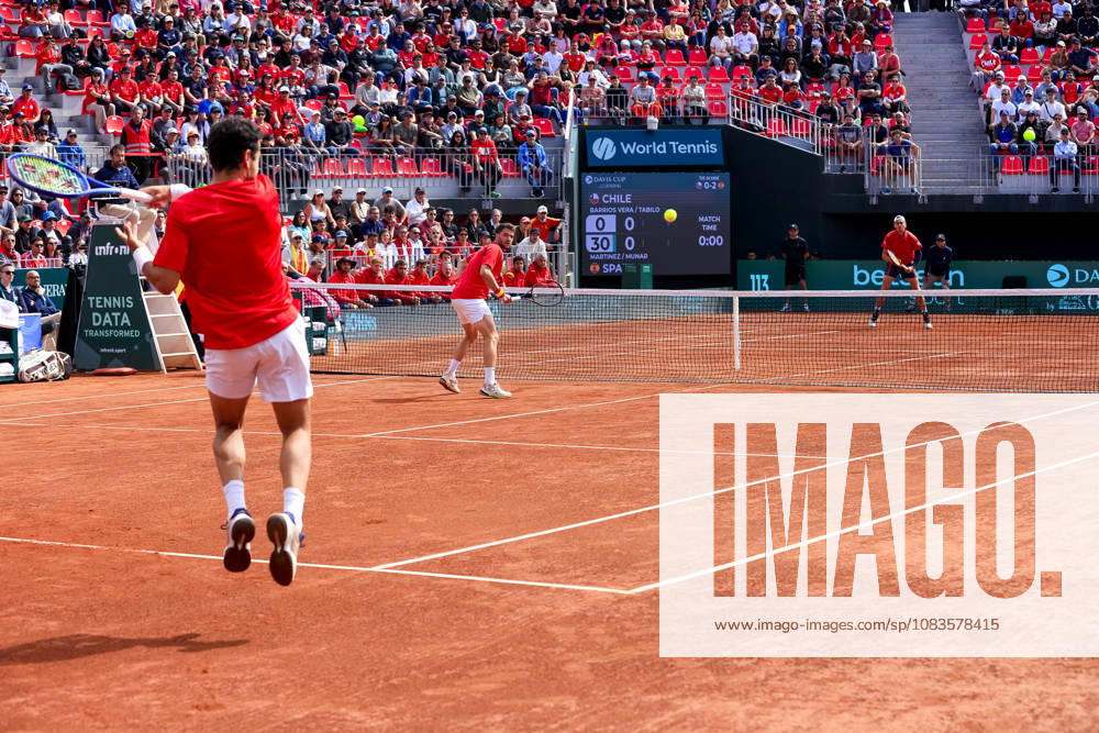 Tenis, Chile vs Espana. Copa Davis 2026. Los tenistas espanoles Jaume Munar izquierda y Pedro Martinez, devuelven la pelota, a Tomas Barrios y Alejandro Tabilo de Chile durante el partido de dobles de la Copa Davis valido por la segunda ronda de clasificatorios para el Grupo Mundials, disputado en el Court Central Anita Lizana, Parque Estadio Nacional en Santiago de Chile. 20 09 2026 Pepe Alvujar Photosport Tenis, Chile vs Espana. Copa Davis 2026. Spanish tennis players Jaume Munar left and Pedro Martinez return the ball to Tomas Barrios and Alejandro Tabilo of Chile during the Davis Cup doubles match valid for the second round of qualifiers for the World Group, played at the Anita Lizana Central Court, National Stadium Park in Santiago, Chile. 20 09 2026 Pepe Alvujar Photosport Chile vs Espana dia 2, Copa Davis 2026