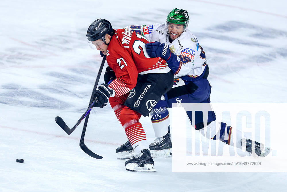 Ice Hockey, DEL, Kölner Haie vs. Eisbären Berlin, Matchday 3, 2026–27 Season, Lanxess Arena, Cologne; Juhani Tyrväinen (Kölner Haie, 21) in a duel against Frederik Tiffels (Eisbären Berlin, 95); North Rhine-Westphalia, Germany