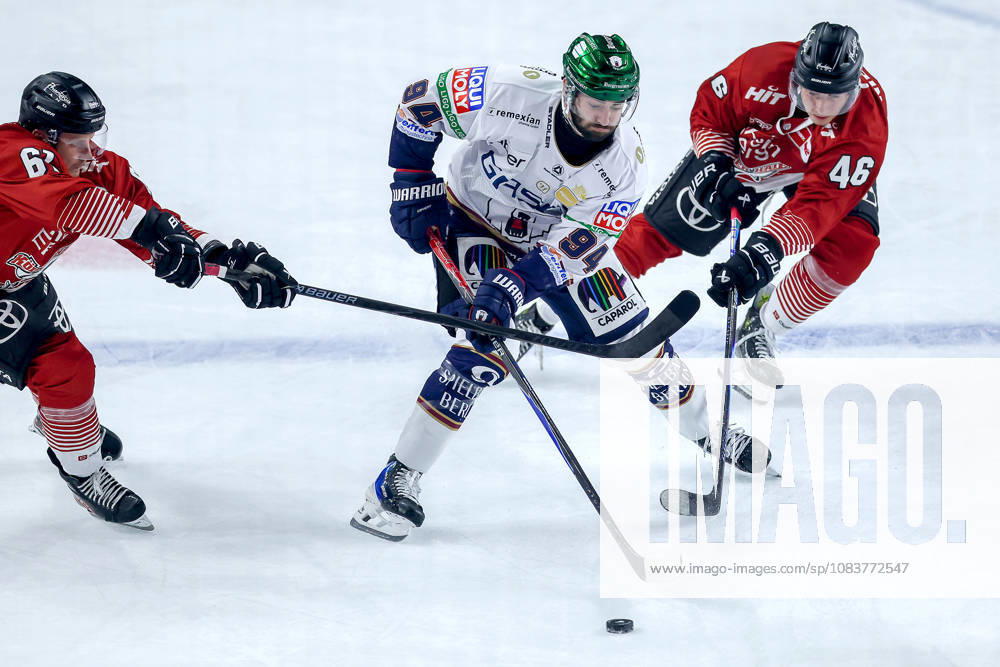 Ice Hockey, DEL, Kölner Haie vs. Eisbären Berlin, Matchday 3, 2026–27 Season, Lanxess Arena, Cologne: Liam Kirk (Eisbären Berlin, 94) battles Kevin Niedenz (Kölner Haie, 46) and Markus Ljungh (Kölner Haie, 61) in North Rhine-Westphalia, Germany