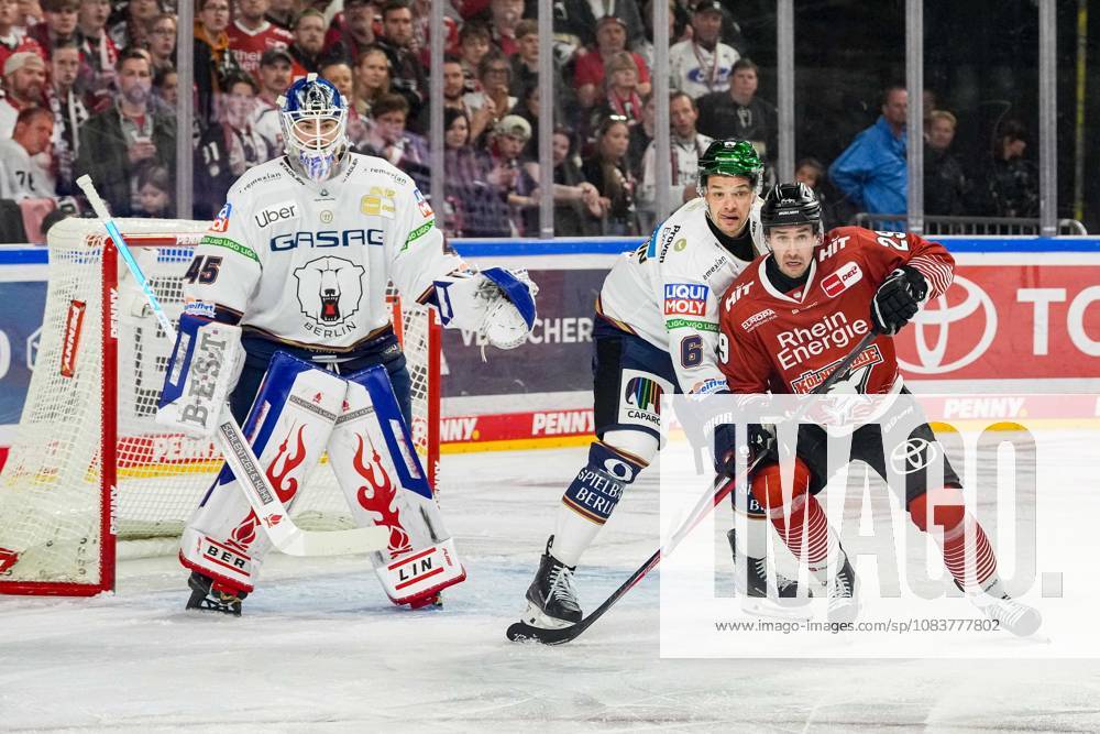Ice Hockey: Penny DEL, Matchday 3—Cologne Sharks vs. Berlin Eisbären on September 25, 2026, at the Lanxess Arena in Cologne. Jack LaFontaine (Berlin), left: Kai Wissmann (Berlin), center: Tim Fleischer (Cologne), right: In accordance with the regulations of the DEL (German Ice Hockey League), the publication and further use of these images in electronic media and on devices of any kind during the game is not permitted