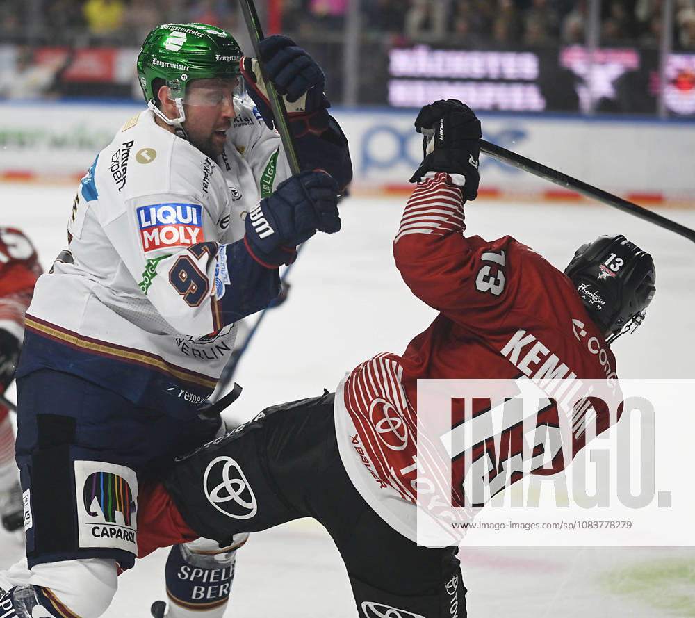 KEC, Ice Hockey, Haie, DEL LanxessArena Kölner Haie vs. Eisbären Berlin; from left to right: Gabriel Fontaine, Eisbären, and Valtteri Kemiläinen; right: KEC Köln Cologne