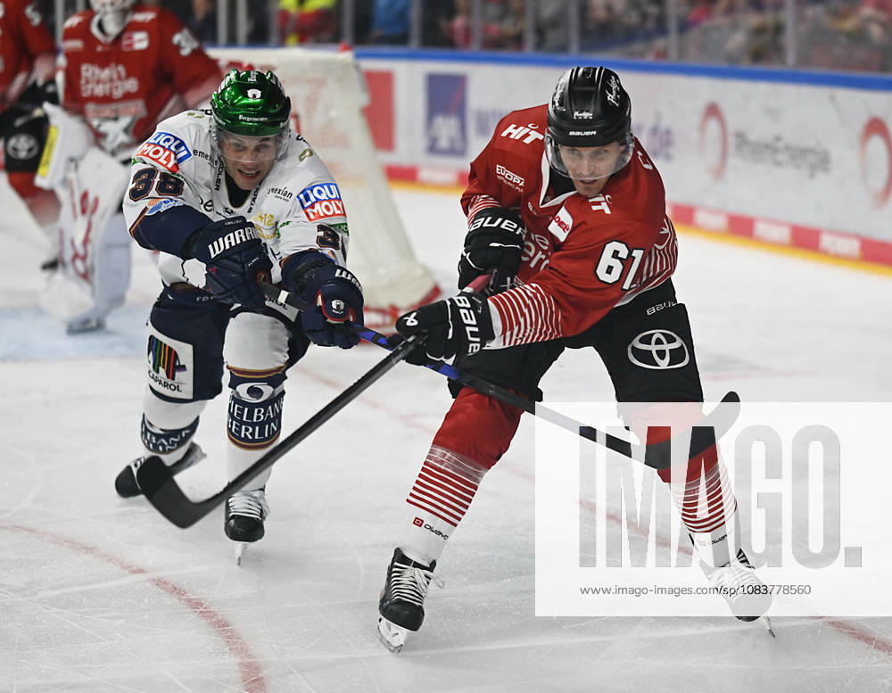 KEC, Ice Hockey, Haie, DEL LanxessArena Kölner Haie vs. Eisbären Berlin. From left to right: Yannick Veilleux, Eisbären, and Markus Ljungh. KEC Cologne