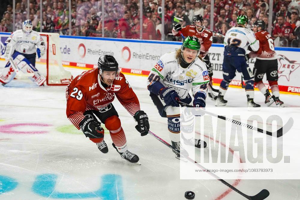 Ice Hockey: Penny DEL, Match Day 3—Cologne Sharks vs. Berlin Eisbären on September 25, 2026, at the Lanxess Arena in Cologne; Tim Fleischer (Cologne), left: Korbinian Geibel (Berlin), right: In accordance with the regulations of the DEL (German Ice Hockey League), the publication and further use of the images in electronic media and on devices of any kind during the game is not permitted