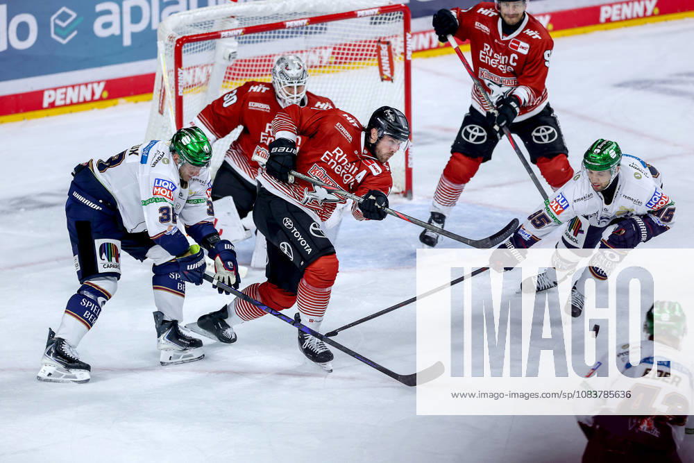 Ice Hockey, DEL, Kölner Haie vs. Eisbären Berlin, Matchday 3, 2026–27 Season, Lanxess Arena, Cologne: Brady Austin (Cologne Sharks) 57 defends against Yannick Veilleux (Berlin Eisbären) 38; Frederik Tiffels (Berlin Eisbären) 95; North Rhine-Westphalia, Germany