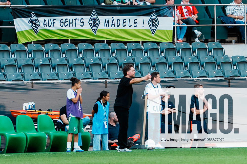 Germany, Soccer: 2026–2027 DFB Women s Cup, First Round: Borussia Mönchengladbach vs. FC Bayern Munich; at Borussia Park; Jonas Spengler, coach of Borussia Mönchengladbach, gesturing in front of the bench, waving and shouting