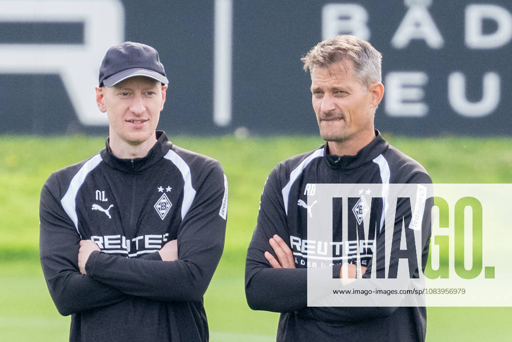 Niklas Lanwehr of Borussia Mönchengladbach, assistant coach, and Alexander Blessin of Borussia Mönchengladbach, head coach, watch the first training session. Public training session: Borussia Mönchengladbach, soccer, Bundesliga, 2026–2027 season, September 29, 2026, public training session for Borussia Mönchengladbach, soccer, Bundesliga, 2026–2027 season, September 29, 2026, Mönchengladbach