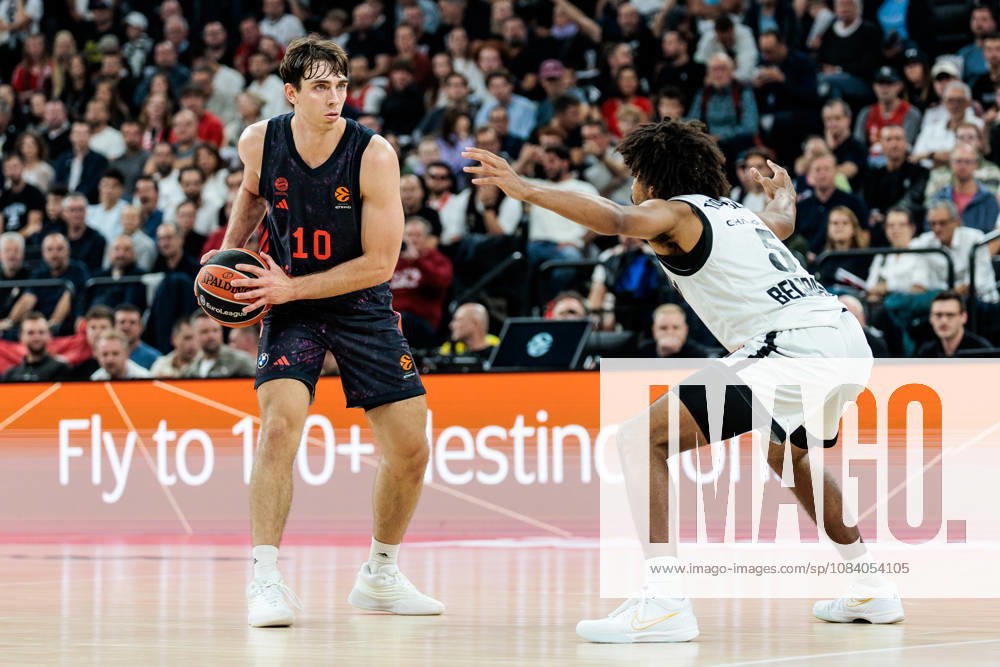 Justinian Jessup (FC Bayern Muenchen, 10) controls the ball against Ethan Thompson (Partizan Mozzart Bet Belgrade, 5) during the Turkish Airlines EuroLeague match between FC Bayern Muenchen vs. Partizan Mozzart Bet Belgrade at SAP Garden on round 3 of Turkish Airlines EuroLeague on October 02, 2026 in Munich, Germany. Bavaria Germany