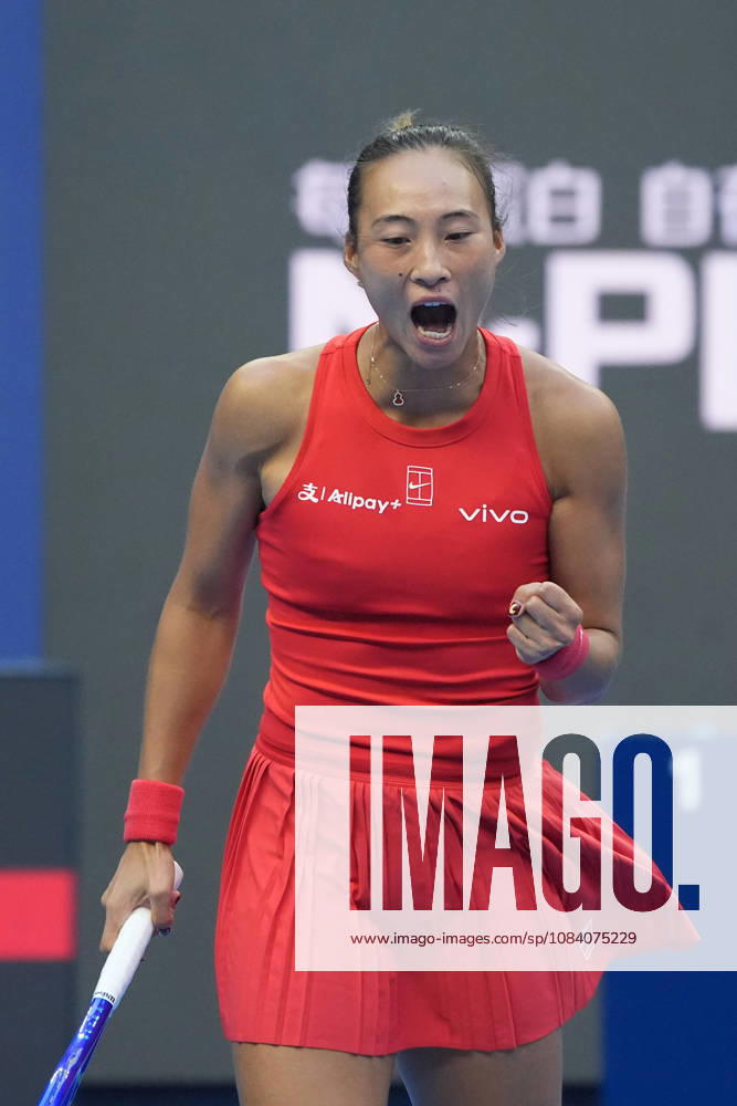 (261003) -- BEIJING, Oct. 3, 2026 -- Zheng Qinwen of China celebrates scoring while competing against Anna Kalinskaya of Russia during the women s singles second round match at 2026 China Open tennis tournament in Beijing, China, Oct. 3, 2026. ) (SP)CHINA-BEIJING-TENNIS-CHINA OPEN-WOMEN S SINGLES(CN) XiexHan