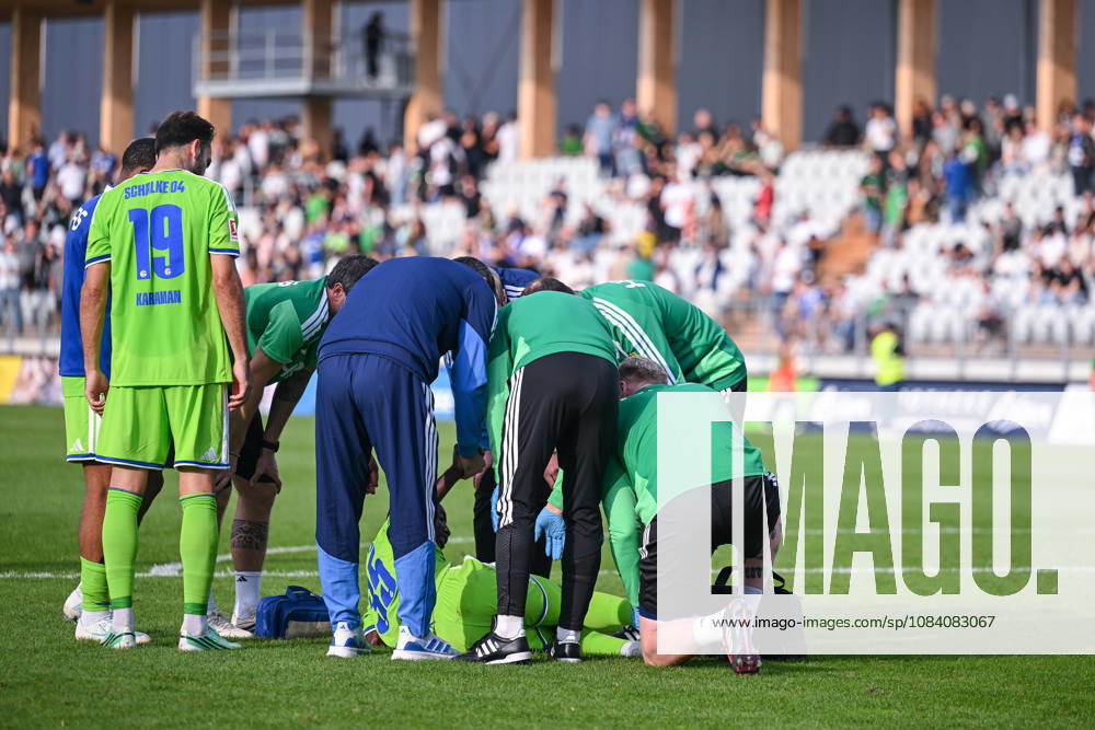 Soccer, 2026–2027 season, friendly match, SC Austria Lustenau vs. FC Schalke 04, Paul Ndiaye of FC Schalke 04 lies injured on the ground and is receiving treatment; coach Miron Muslic of FC Schalke 04 holds his hand, xRHR PHOTO YYx