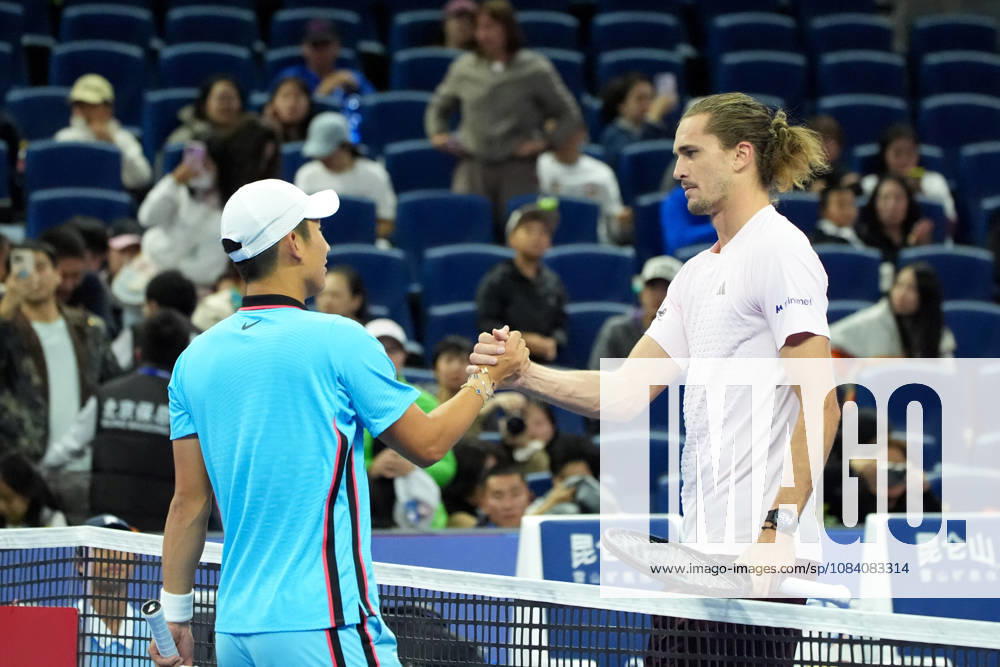 (261003) -- BEIJING, Oct. 3, 2026 -- Shang Juncheng (L) of China greets Alexander Zverev of Germany after their men s singles second round match at 2026 China Open tennis tournament in Beijing, China, Oct. 3, 2026. ) (SP)CHINA-BEIJING-TENNIS-CHINA OPEN-MEN S SINGLES(CN) XiexHan