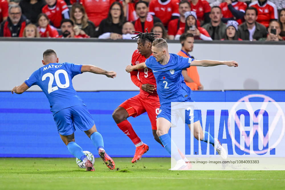 Aljosa Matko of Slovenia, Johan Manzambi of Switzerland, and Zan Karnicnik of Slovenia battle for the ball during the UEFA Nations League 2026–27 group stage match between Switzerland and Slovenia at Luzern Arena on October 3, 2026, in Lucerne, Switzerland. Photo by Harry Langer, DeFodi Images