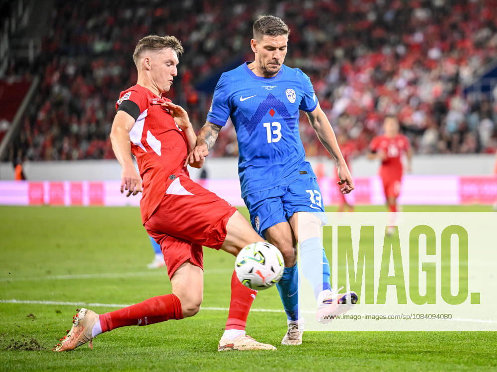 Michel Aebischer of Switzerland and Erik Janza of Slovenia battle for the ball during the UEFA Nations League 2026–27 group stage match between Switzerland and Slovenia at Luzern Arena on October 3, 2026, in Lucerne, Switzerland. Photo by Harry Langer, DeFodi Images