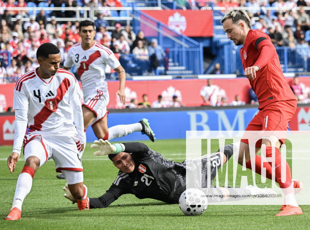 Peru goalkeeper Diego Romero (21) and Marcos Lopez (4) defend against Canada s Liam Millar (11) during first half International Friendly, Länderspiel, Nationalmannschaft soccer action in Montreal, on Saturday, Oct. 3, 2026. Canada News - October 3, 2026 - ZUMAc35_ 20261003_zaf_c35_031