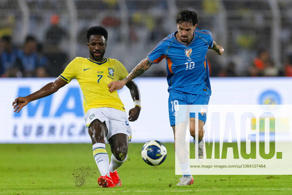 Vinicius Junior of Brazil and Ryan Williams of India duel for the ball during friendly match between India and Brazil at the Vivekananda Yuba Bharati Krirangan (VYBK) Stadium in Kolkata, India on 3rd October, 2026