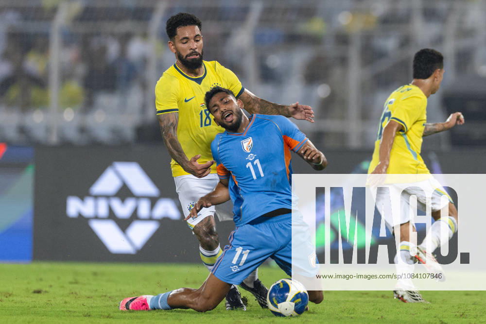 Douglas Luiz Soares de Paulo of Brazil and Rahim Ali of India duel for the ball during friendly match between India and Brazil at the Vivekananda Yuba Bharati Krirangan (VYBK) Stadium in Kolkata, India on 3rd October, 2026
