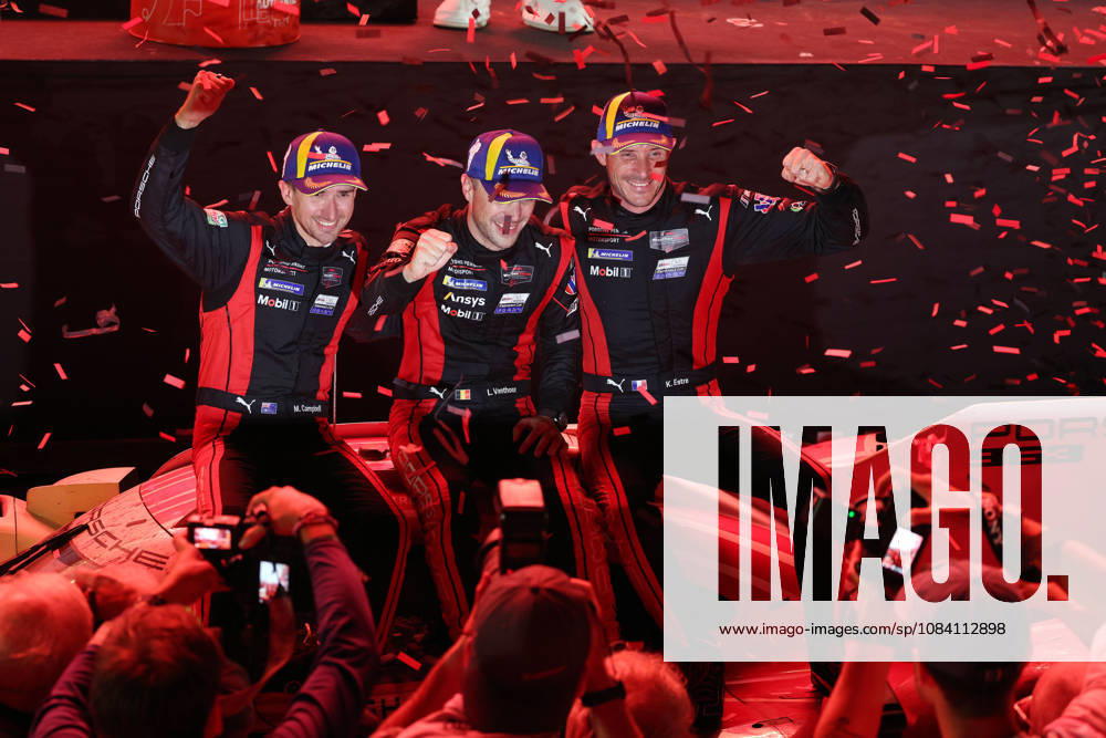 Race winners Matt Campbell (AUS), Laurens Vanthoor (BEL), and Kevin Estre (FRA) sit in the Porsche 963 at the 6th-place podium ceremony, IMSA Racing Series, 29th Motul Petit Le Mans race, Road Atlanta, Georgia, USA, October 3, 2026, 10-hour race