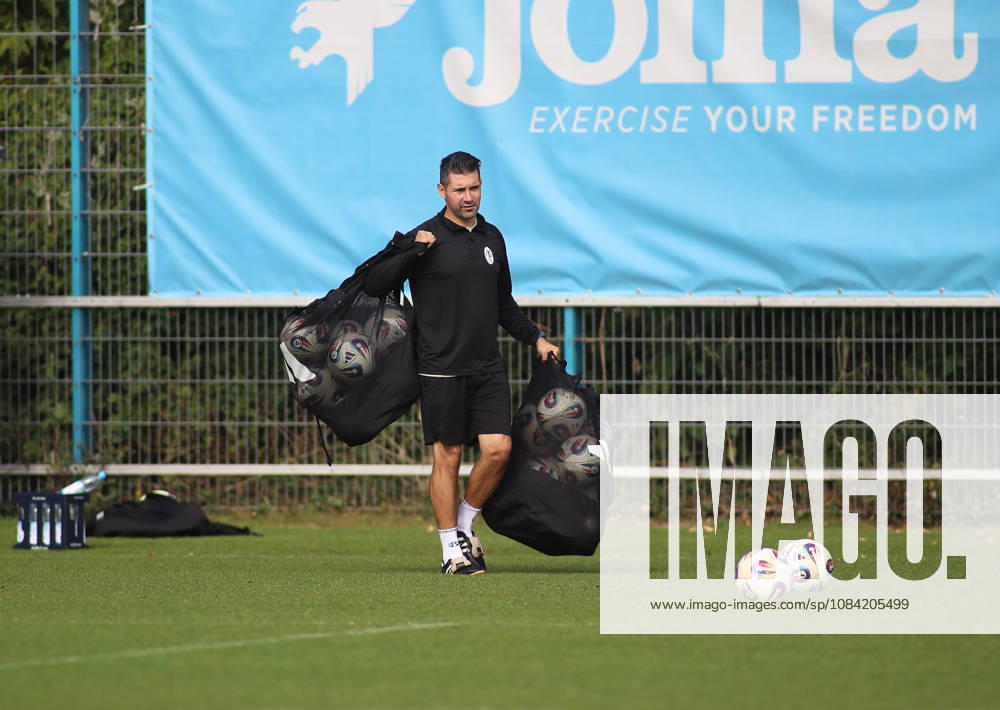 Soccer, Men s, Bavarian Regional League, 2026–2027 Season, TSV 1860 Munich, Practice, Grünwalder Strasse 114, Alper Kayabunar, coach of TSV 1860 Munich, walking across the practice field carrying two soccer nets