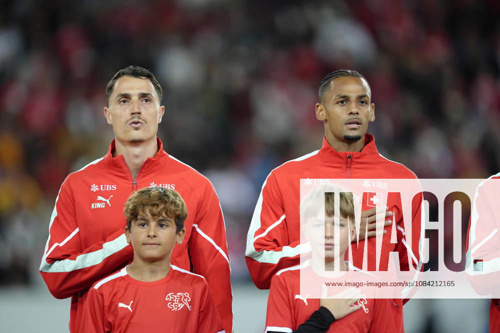 Vincent Sierro (6 SUI) and Mohameth Djibril Ibrahima Sow (15 SUI) during National anthem before the UEFA Nations League match between Switzerland and North Macedonia at thermoplan arena on October 06, 2026 in Luzern, Switzerland.