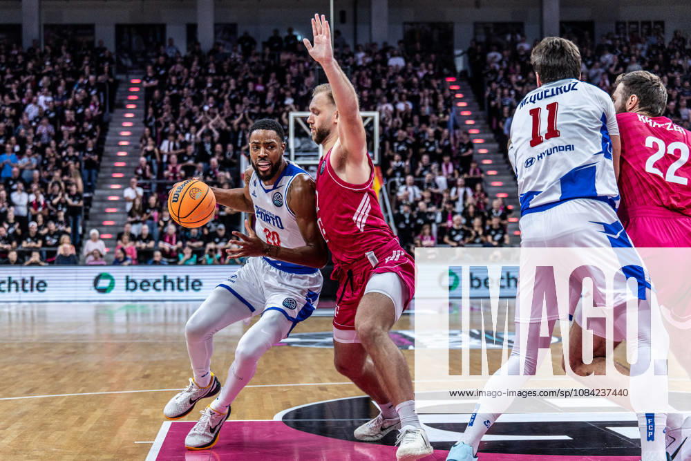 Xeyrius Williams, FC Porto, 20 vs. Melvin Jostmann, Telekom Baskets Bonn, 12; Telekom Baskets Bonn vs. FC Porto, Basketball, Basketball Champions League, Matchday 1, 2026–2027, October 7, 2026 Telekom Baskets Bonn vs. FC Porto, Basketball, Basketball Champions League, Matchday 1, 2026–2027, October 7, 2026 Bonn