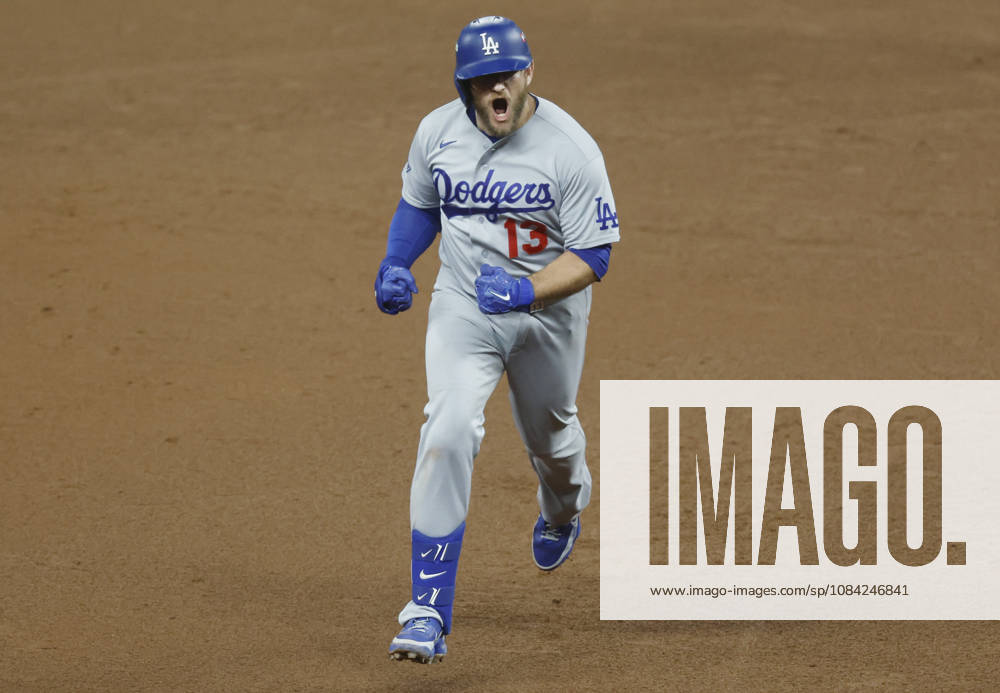 Los Angeles Dodgers Max Muncy (13) runs the bases after hitting a solo home run in the ninth inning against the Atlanta Braves in an MLB, Baseball Herren, USA National League Division Series playoff game at Truist Park in Atlanta, Georgia, on Wednesday, October 7, 2026. The Dodgers defeated the Braves 4-1 to win the series 3 games to 1 and advance to the Championship round. ATL20261007724 MIKExZARRILLI