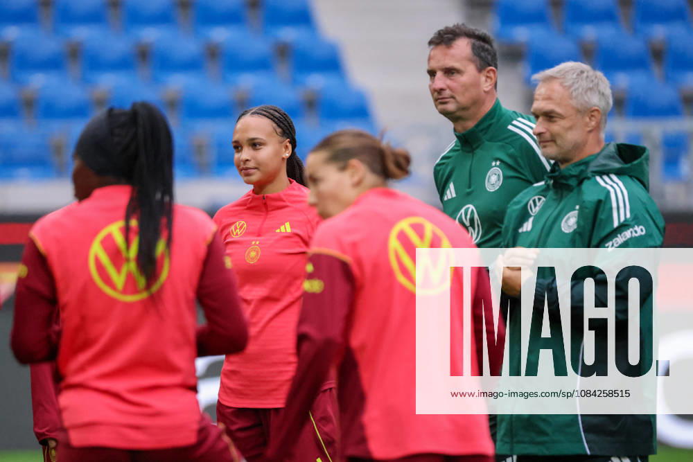 German Women s National Soccer Team: Final Training Session for the Friendly Match Between Germany and Australia Pictured, from left: Lisa Baum (Germany), goalkeeper coach Michael Fuchs (Germany), and national team coach Christian Wück (Germany)