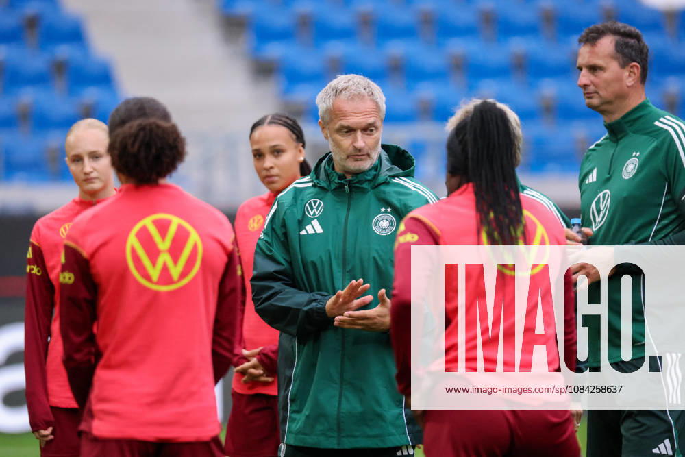 German Women s National Soccer Team: Final Training Session for the Friendly Match Between Germany and Australia. Pictured: National Team Coach Christian Wück (Wueck) of Germany speaking to the players of the German Women s National Soccer Team during a team meeting.