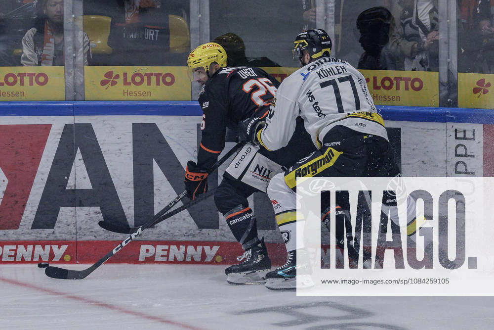 Penny DEL Löwen Frankfurt vs. Krefeld Pinguine, October 8, 2026: Dominik Uher (Löwen Frankfurt, 26) and Mick Köhler (Krefeld Pinguine, 77) battle for the puck along the boards, Löwen Frankfurt vs. Krefeld Pinguine, Frankfurt, NIX Ice Arena