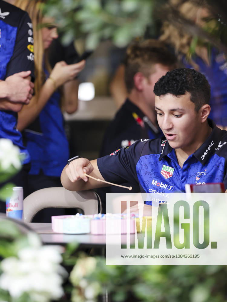 ISACK HADJAR of Oracle Red Bull Racing enjoys a light-hearted moment playing a fishing game in the team s hospitality area in the paddock ahead of the 2026 Formula 1 Singapore Grand Prix at Marina Bay Street Circuit in Singapore. Singapore Singapore - ZUMAh201 20261008_zsp_h201_024