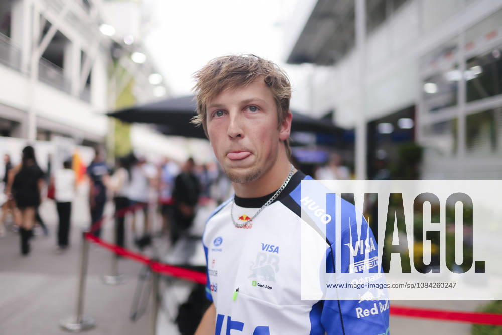 LIAM LAWSON of Visa Cash App Racing Bulls playfully sticks out his tongue while making a funny face in the paddock ahead of the 2026 Formula 1 Singapore Grand Prix at Marina Bay Street Circuit in Singapore. Singapore Singapore - ZUMAh201 20261008_zsp_h201_031