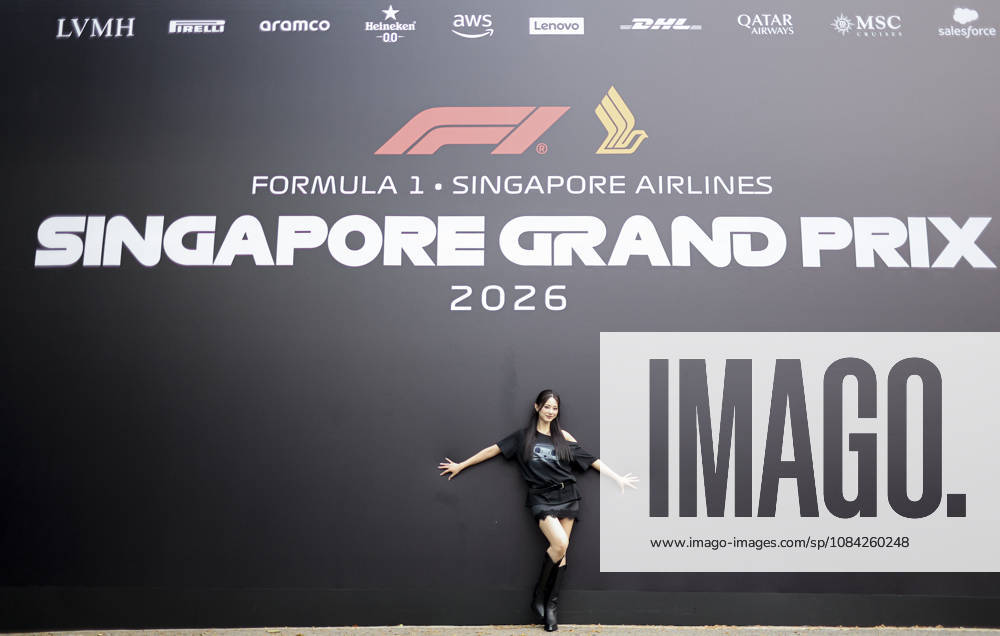 TZUYU (CHOU TZU-YU), Taiwanese member of K-pop girl group TWICE, poses for photographers in front of the Formula 1 Singapore Grand Prix backdrop during her visit to Marina Bay Street Circuit Singapore Singapore - ZUMAh201 20261008_zsp_h201_032