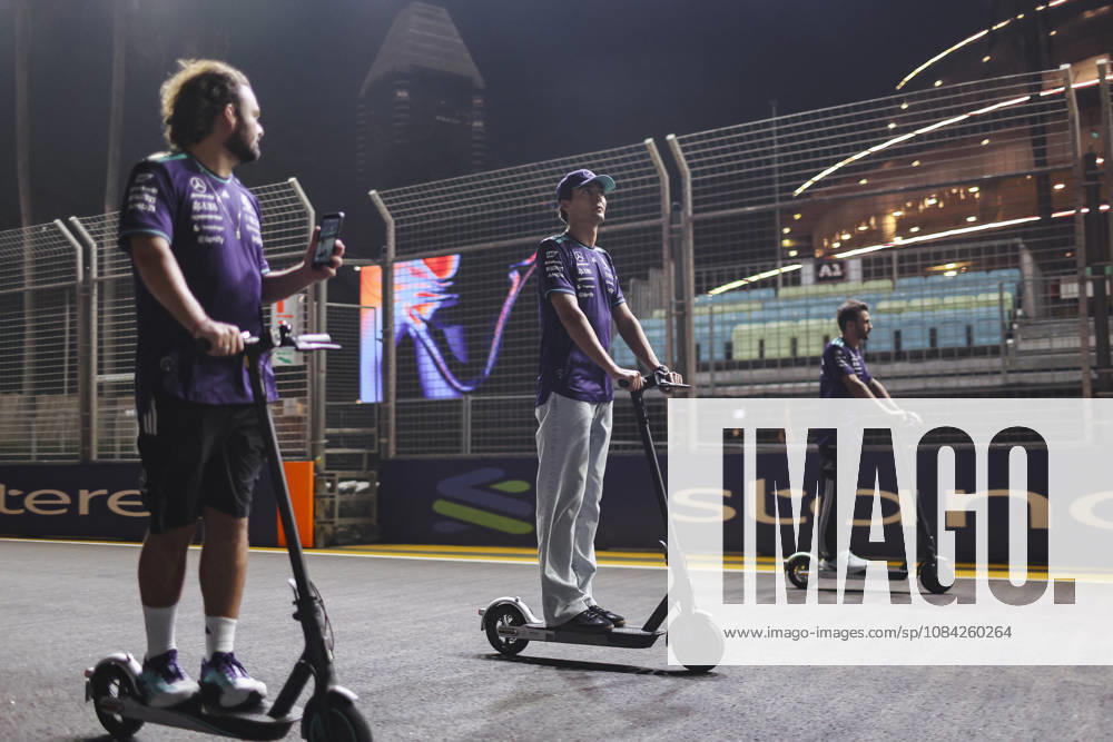 GEORGE RUSSELL of Mercedes-AMG Petronas Formula One Team rides an electric scooter through the paddock and poses for photographers ahead of the 2026 Formula 1 Singapore Grand Prix at Marina Bay Street Circuit in Singapore. Singapore Singapore - ZUMAh201 20261008_zsp_h201_038