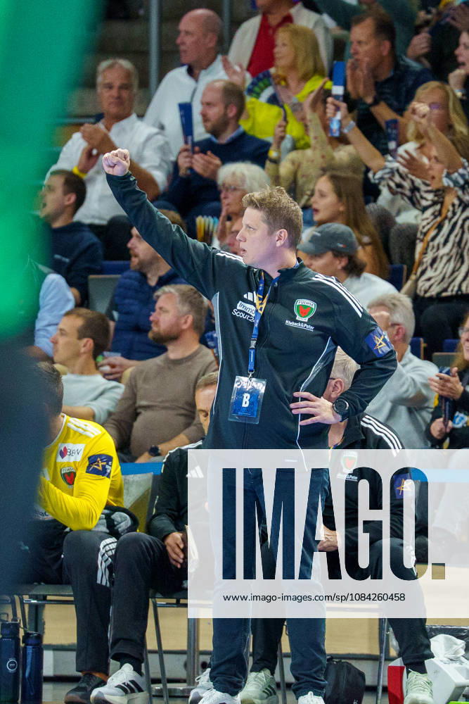 Pictured: Nicolej Krickau of Füchse Berlin, coach, celebrating on October 8, 2026; Füchse Berlin vs. FC Porto, EHF Handball Champions League, 2026–27 season, Max Schmeling Halle