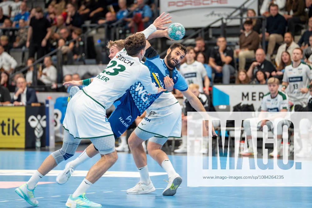 Handball I Men I 2026–2027 Season I Bundesliga I Matchday 8 I TVB Stuttgart vs. HSG Wetzlar I October 8, 2026: Mohamed Amine Darmoul (70) of TVB Stuttgart is defended on a shot by Marti Soler Biescas (23), HSG Wetzlar, Stuttgart Porsche Arena, Baden-Württemberg, Germany