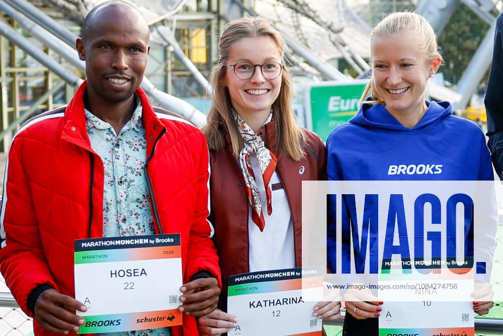 Munich Marathon 2026 Press Conference, Munich, October 9, 2026: Hosea Tuwei (KEN), Katharina Saathoff (GER), and Nina Reuter (GER) pose for a group photo at the Munich Marathon 2026 press conference in Munich