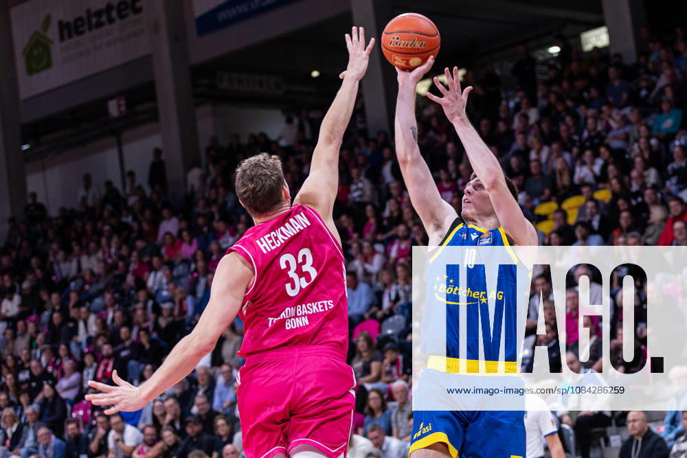 EasyCredit Basketball Bundesliga, Telekom Baskets Bonn vs. Science City Jena, October 9, 2026 Christian Skladanowski Science City Jena 10 over Patrick Heckmann Telekom Baskets Bonn 33 easyCredit Basketball Bundesliga, Telekom Baskets Bonn vs. Science City Jena, October 9, 2026, Telekom Dome Bonn