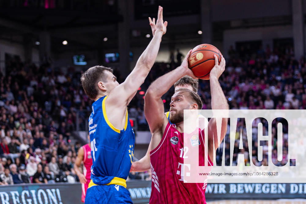 EasyCredit Basketball Bundesliga, Telekom Baskets Bonn vs. Science City Jena, October 9, 2026: Melvin Jostmann (Telekom Baskets Bonn) 12, Lorenz Bank (Science City Jena) 25; easyCredit Basketball Bundesliga, Telekom Baskets Bonn vs. Science City Jena, October 9, 2026, Telekom Dome Bonn