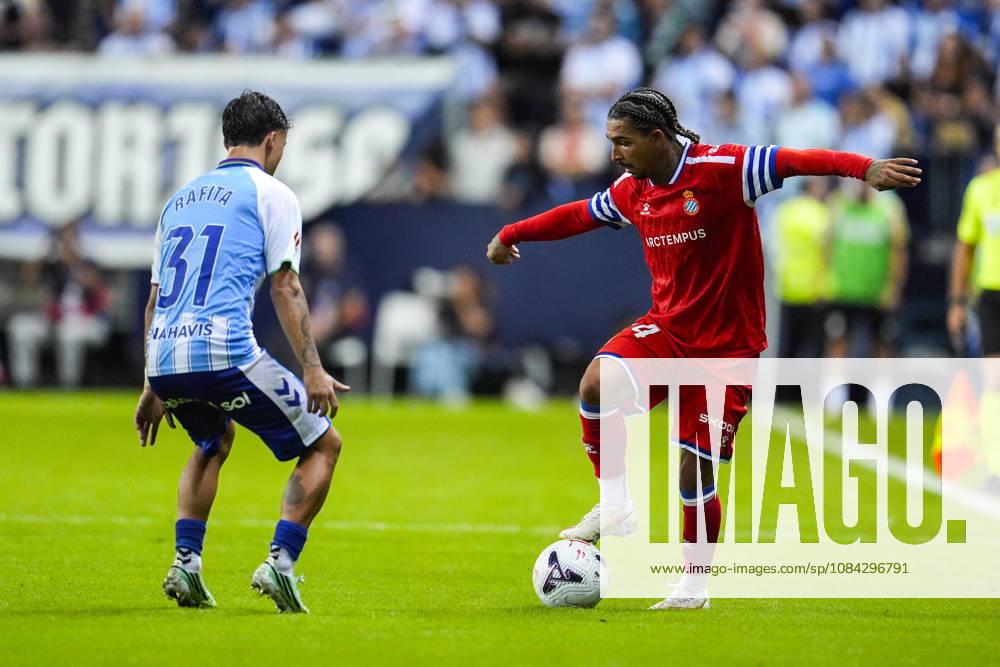 Tyrhys Dolan of RCD Espanyol and Rafita Garrido of Malaga CF in action during the Spanish league, LaLiga EA Sports, football match played between Malaga CF and RCD Espanyol at La Rosaleda stadium on October 9, 2026, in Malaga, Spain. Malaga CF V RCD Espanyol - LaLiga EA Sports - ZUMAa181 20261009_zaa_a181_362