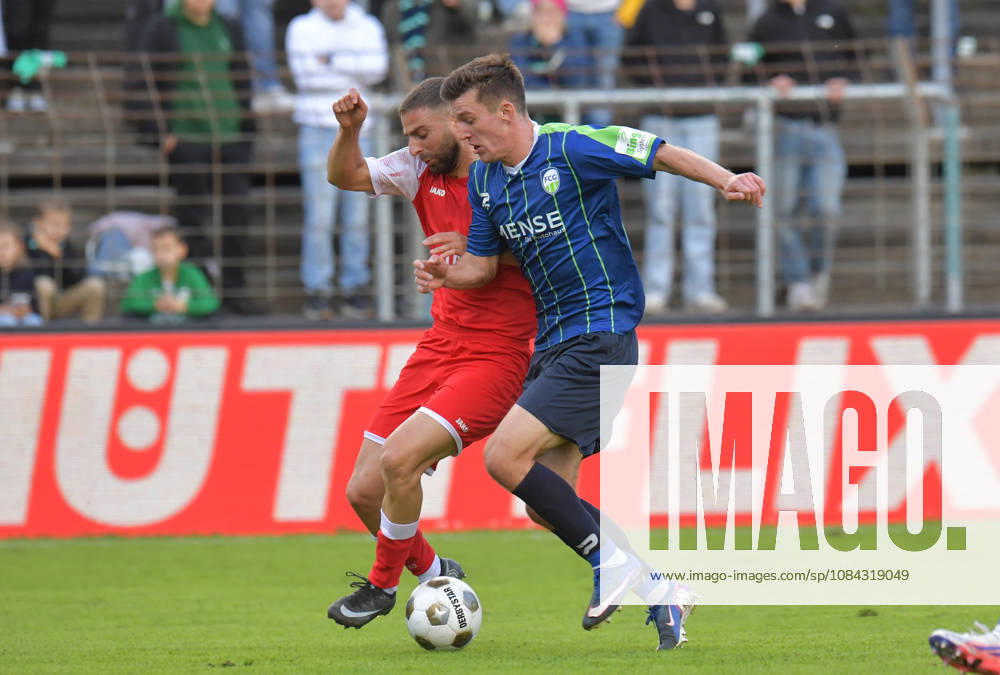 GER, Soccer, Regionalliga West, 2026–2027 Season, Matchday 12, Ohlendorf Stadium in Heidewald, Gütersloh FC vs. SF Siegen 0–5, Aleksandar Kandic (FC Gütersloh, right) vs. Serhat Semih Güler (SF Siegen), action, duel, tackle